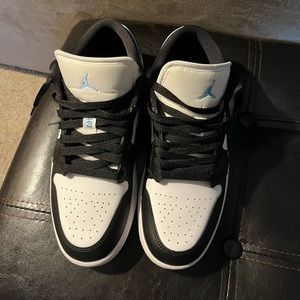 Jordan 1 Lows Black White and University Colors